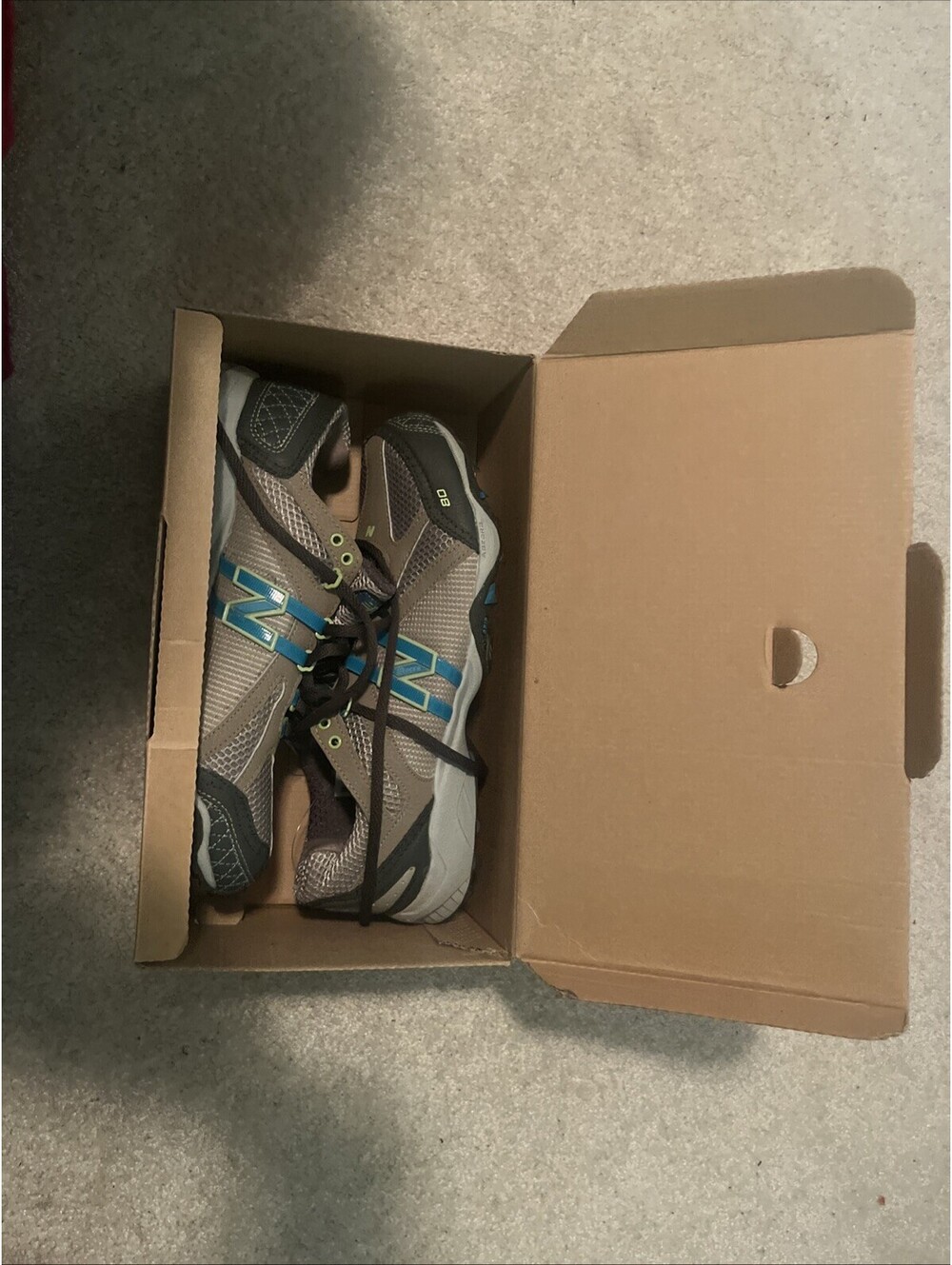 Women’s Size 9.5- New Balance  low top Sneakers.